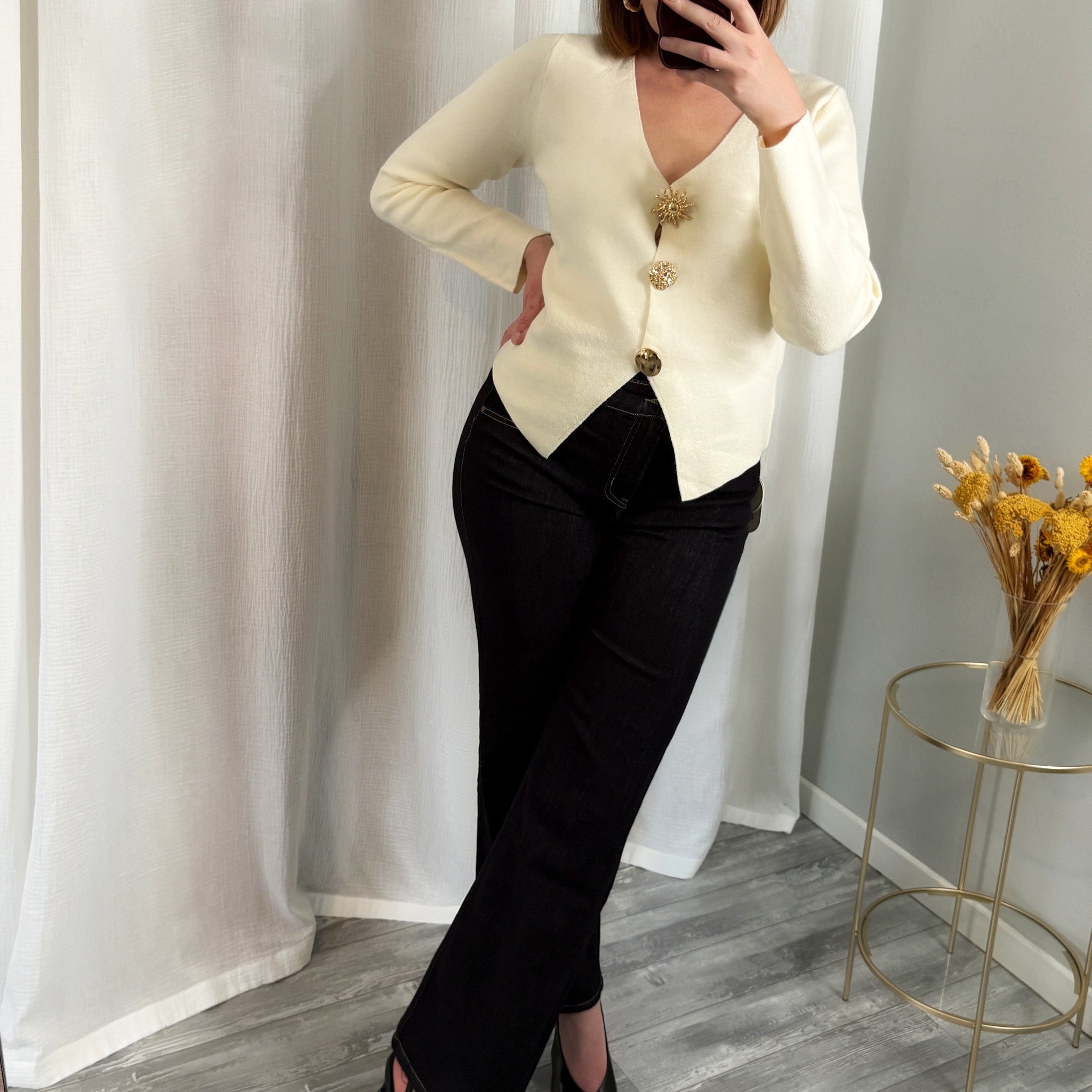 Gilet beige à boutons soleil dorés