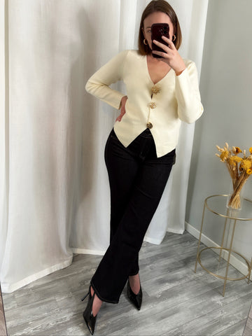 Gilet beige à boutons soleil dorés