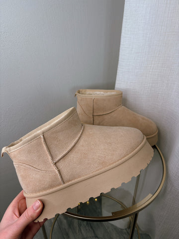 Mules fourrées à semelle épaisse beiges